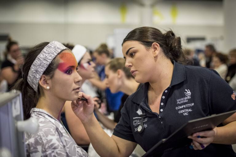 Apprentices completing in a WorldSkills makeup application event.